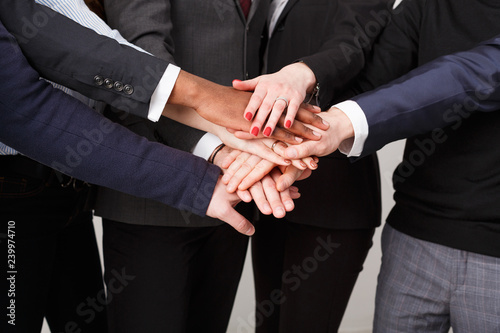 Teamwork and teambuilding, people connect hands