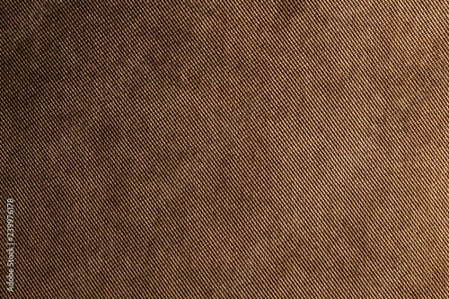 Textured background large brown textile. Texture of textile fabric close-up