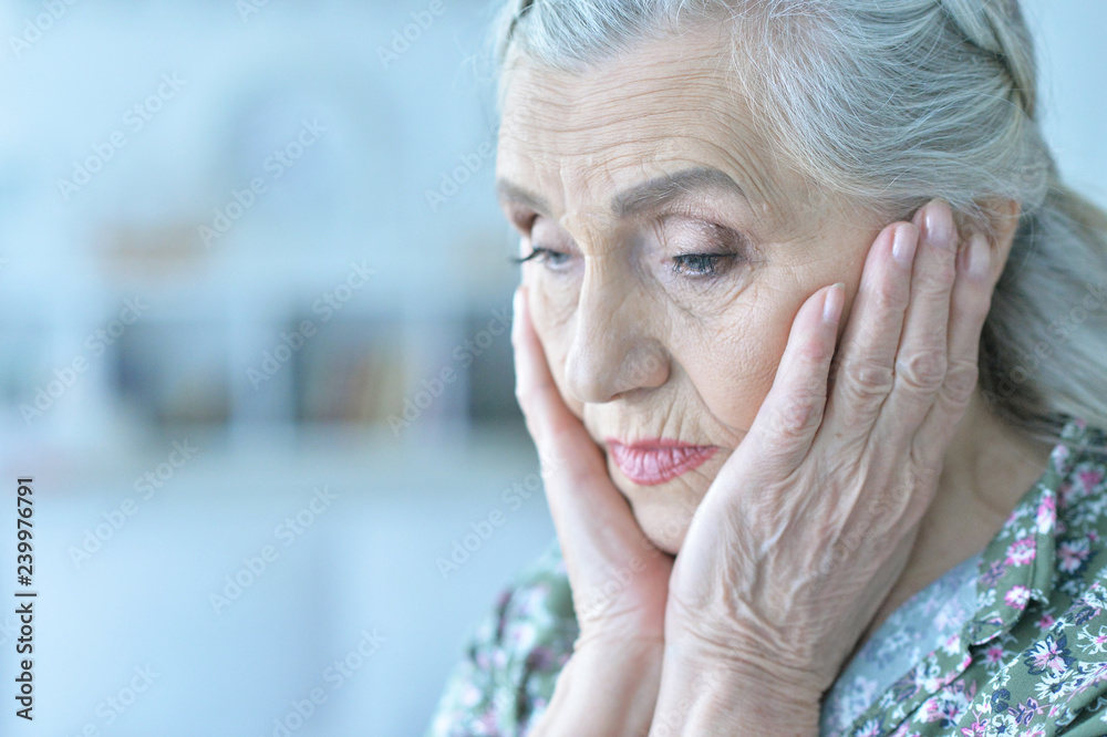 Portrait of sad senior woman at home Portrait of sad senior woman at home
