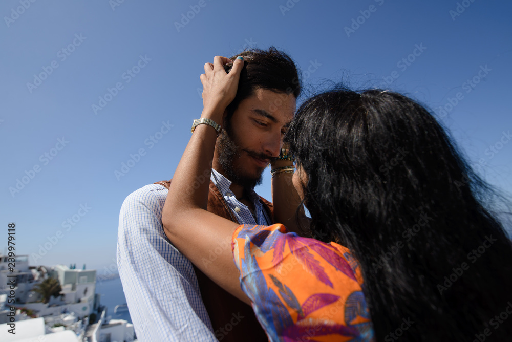 The lovely couple in love kissing near sea The lovely couple in love kissing near sea