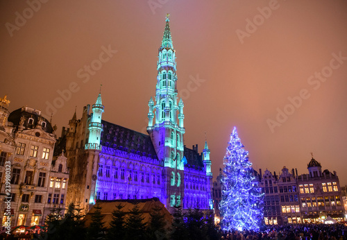 Christmas lights show on the Grand Place with a huge Christmas tree in BRUSSELS, BELGIUM. 16-12-2018