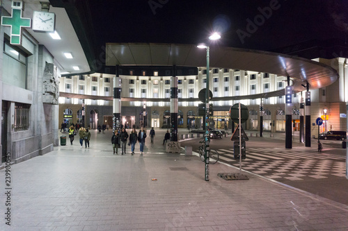 Travelers commuting at Brussels Central Station at night