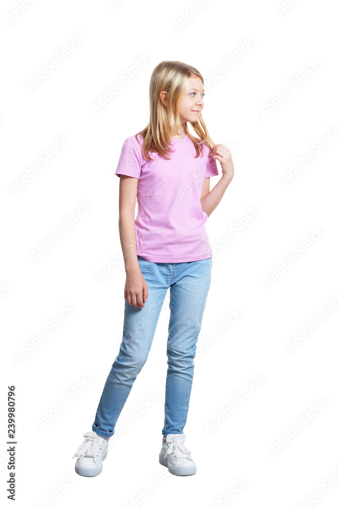 Fototapeta premium Cute girl in casual clothing posing on white background