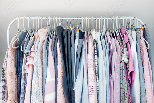 Fashion winter coats hanged on a clothes rack