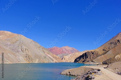 Laguna Agua Negra lagoon with andean mountains at the road to the Paso Agua De Negra, Elqui valley, Vicuna, Chile