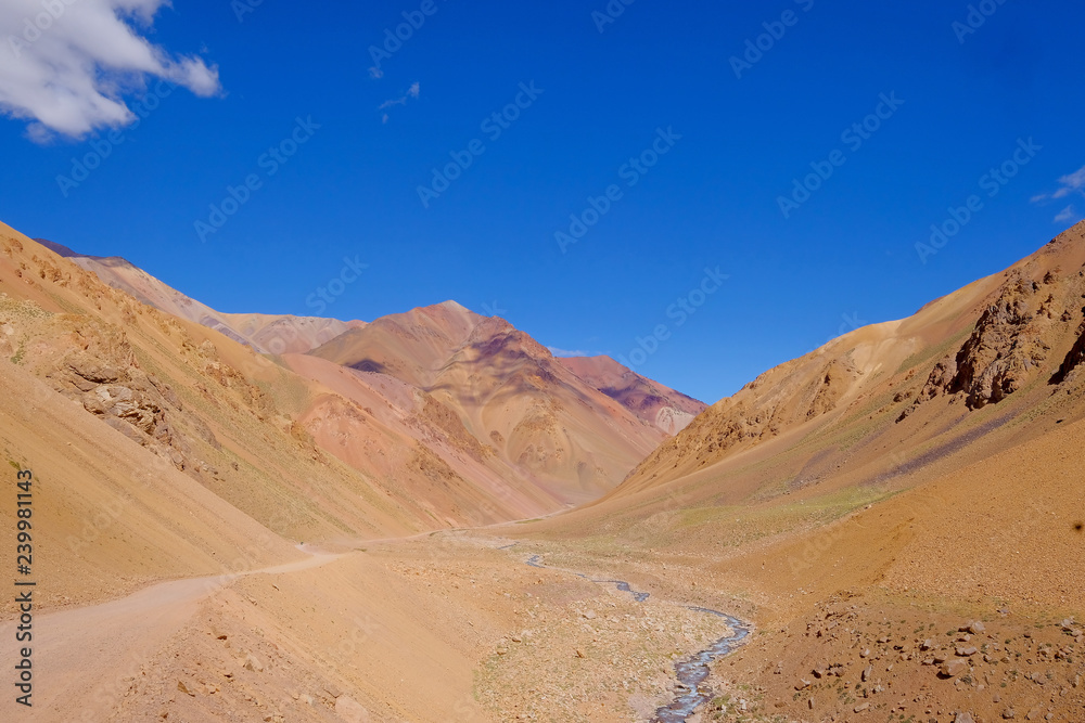 Andes landscape and the road leading to Paso De Agua Negra mountain pass, Region de Coquimbo, Chile to Argentina