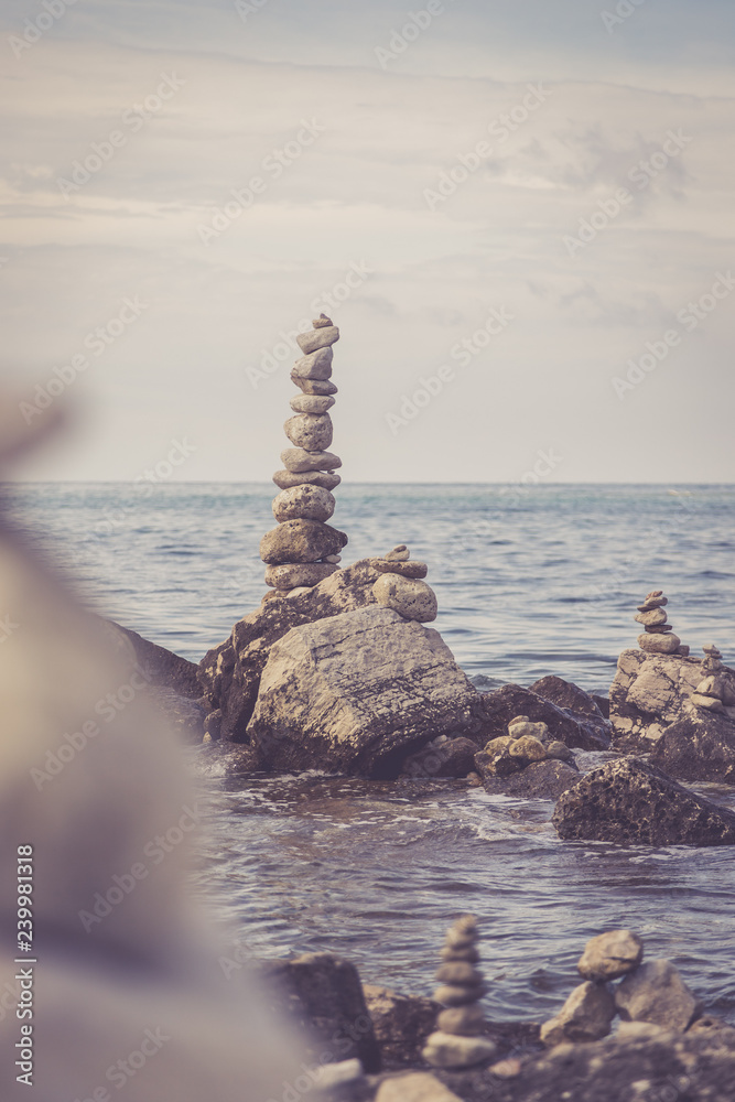 Spiritual stonemen at the coast of Croatia, ocean Spiritual stonemen at the coast of Croatia, ocean