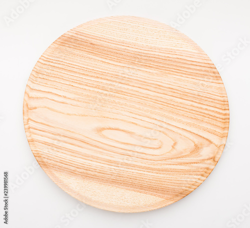 Empty circle wooden tray isolated on white background