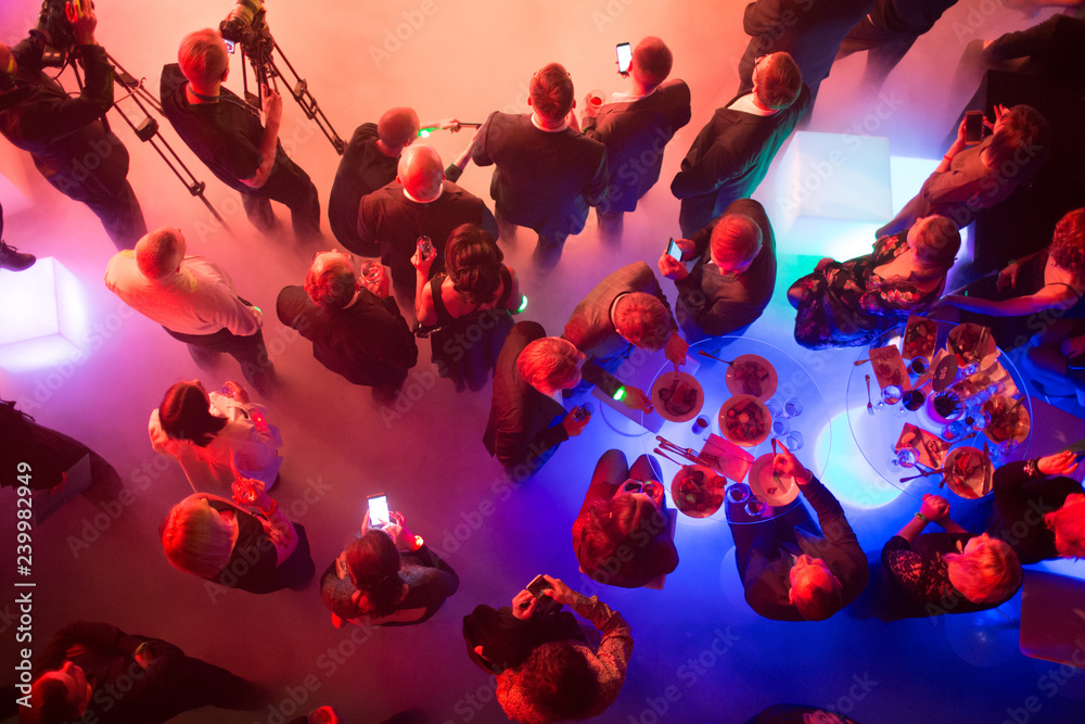 Party and corporate concept. People at the tables, top view. - obrazy, fototapety, plakaty 