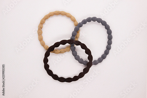 Hair accessories. Three hair ties on a white background photo