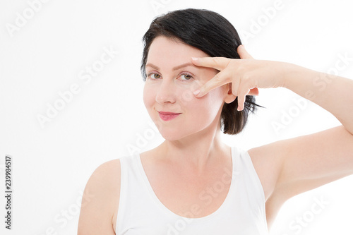 Wallpaper Mural Macro Woman face with wrinkles near eyes. Collagen and face injections concept. Menopause. Cropped image. Copy space and mock up. Plastic surgery Torontodigital.ca