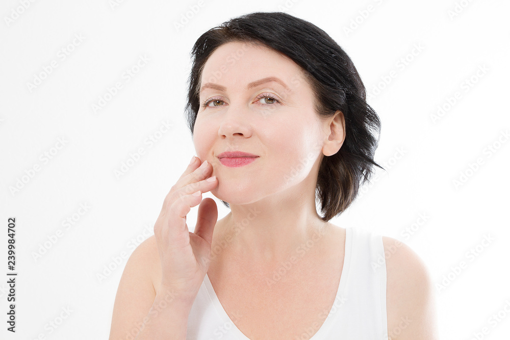 Beauty middle age woman face portrait. Spa and anti aging concept Isolated on white background. Plastic surgery and collagen face injections. Wrinkles and menopause. Mock up. Copy space Beauty middle age woman face portrait. Spa and anti aging concept Isolated on white background. Plastic surgery and collagen face injections. Wrinkles and menopause. Mock up. Copy space