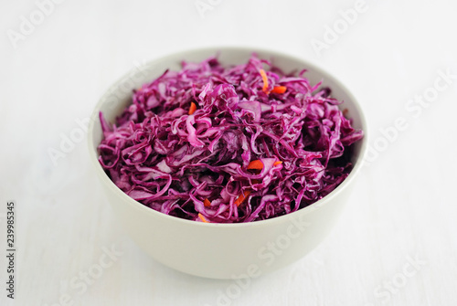 Fork on bowl with purple sauerkraut