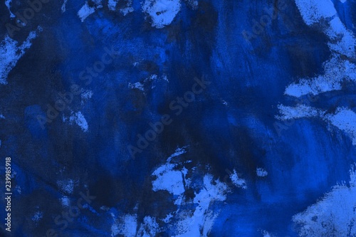creative old blue randomly painted canvas, fabric with color paint spots and blots texture for background use.