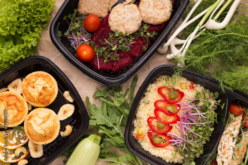 Obraz na plátně Different types of takeaway food in microwavable containers