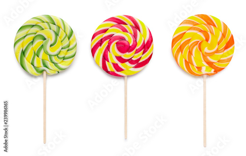 Wallpaper Mural Three colorful lollipops isolated on white Torontodigital.ca