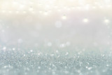 Silver and white glitter abstract bokeh background Christmas