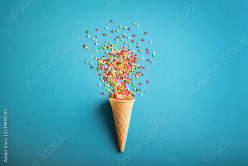 Ice cream cone with colorful stars confetti