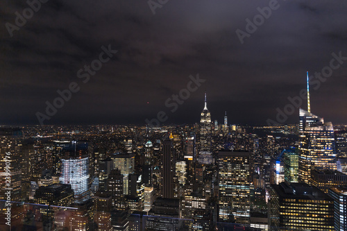 aerial view of buildings and night city lights in new york, usa