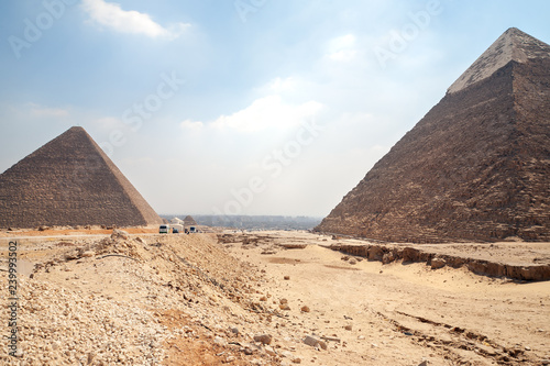 Pyramids of Giza - Chephren and Cheops back side and background view on Cairo  the capital of Egypt