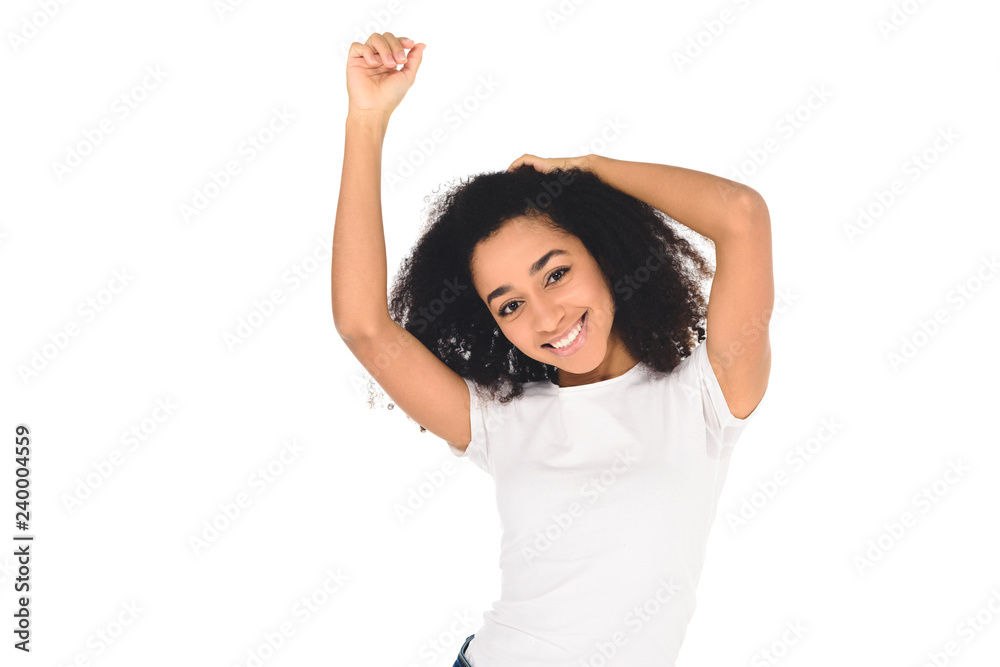 african american girl raising hands and smiling at camera isolated on white african american girl raising hands and smiling at camera isolated on white
