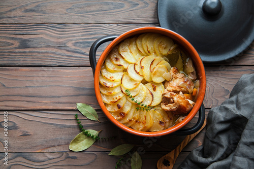 Murais de parede Homemade Lancashire hotpot - a stew  consists of lamb, onion, carrot, Worcestershire sauce, topped with sliced potatoes, bay leaves, thyme  and baked in a heavy pot on a low heat