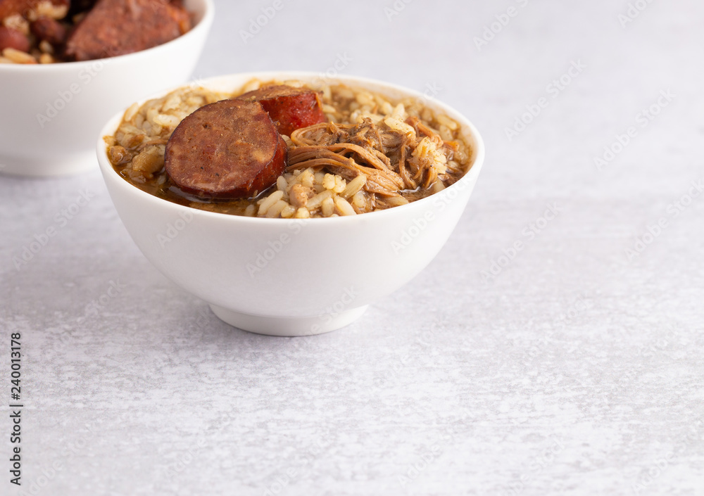 Bowl of Chicken and Sausage Gumbo with Red Beans and Rice with Sausage on the Side Bowl of Chicken and Sausage Gumbo with Red Beans and Rice with Sausage on the Side