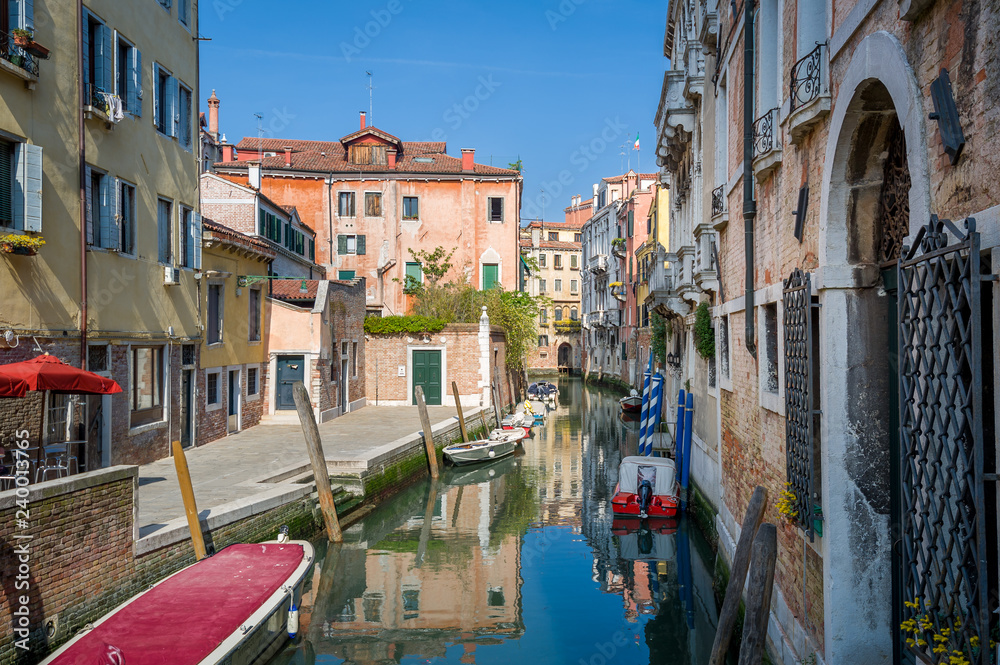 Narrow water channel in the center of Venice old town