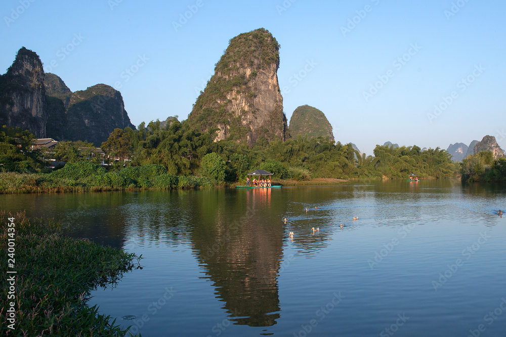 Karst mountains and limestone peaks of Yulong River, Yangshuo, Guilin, China Karst mountains and limestone peaks of Yulong River, Yangshuo, Guilin, China