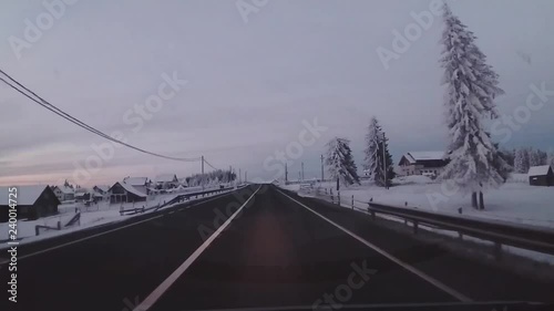 Driving on a snowy mountain road
