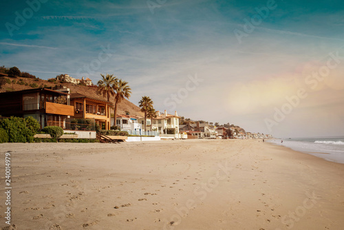 The beach of Malibu at sunset photo