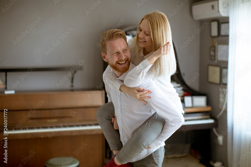 Loving young having fun in the room Loving young having fun in the room