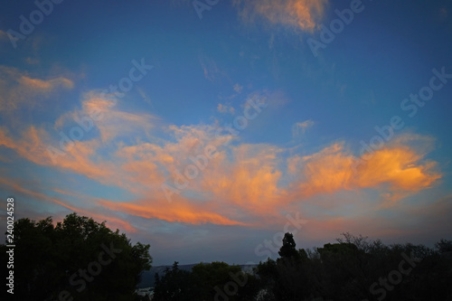 Sky with clouds after sunset on Filopappou hill photo