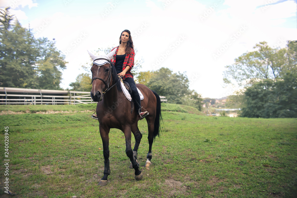 Girl riding a horse