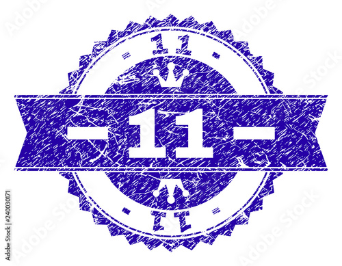 11 rosette stamp imitation with grunge style. Designed with round rosette, ribbon and small crowns. Blue vector rubber watermark of 11 caption with unclean style.