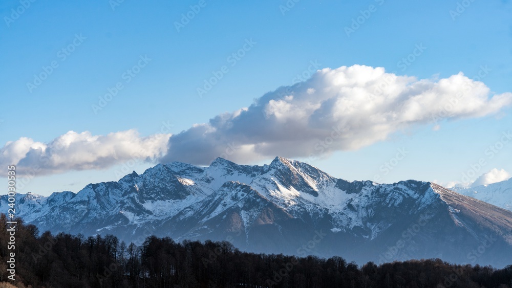 Peak of the mountain covered by snow, winter in Sochi, Russia.