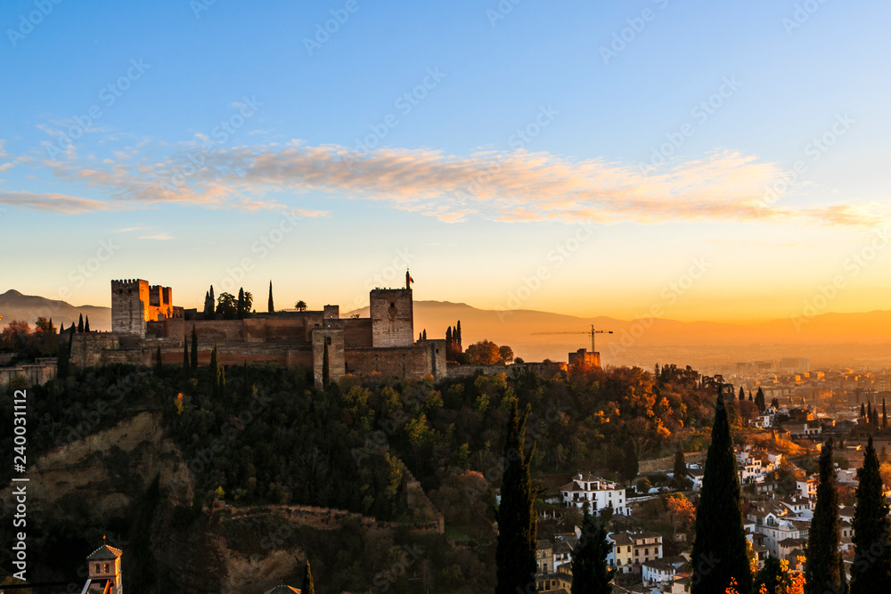 Alhambra Palace in Granada, Andalucia, Spain in golden hour at sunset.