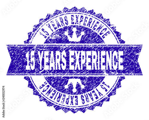 15 YEARS EXPERIENCE rosette seal imprint with grunge texture. Designed with round rosette, ribbon and small crowns. Blue vector rubber watermark of 15 YEARS EXPERIENCE label with grunge texture.