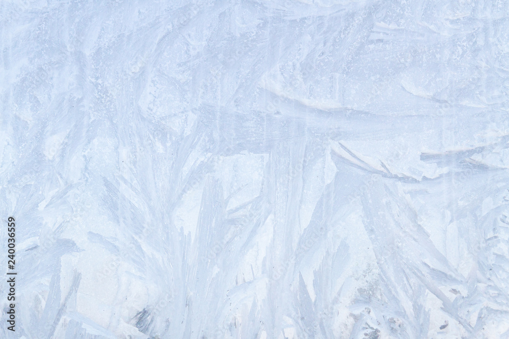 Frosty patterns on a frozen ice box in the early morning Frosty patterns on a frozen ice box in the early morning