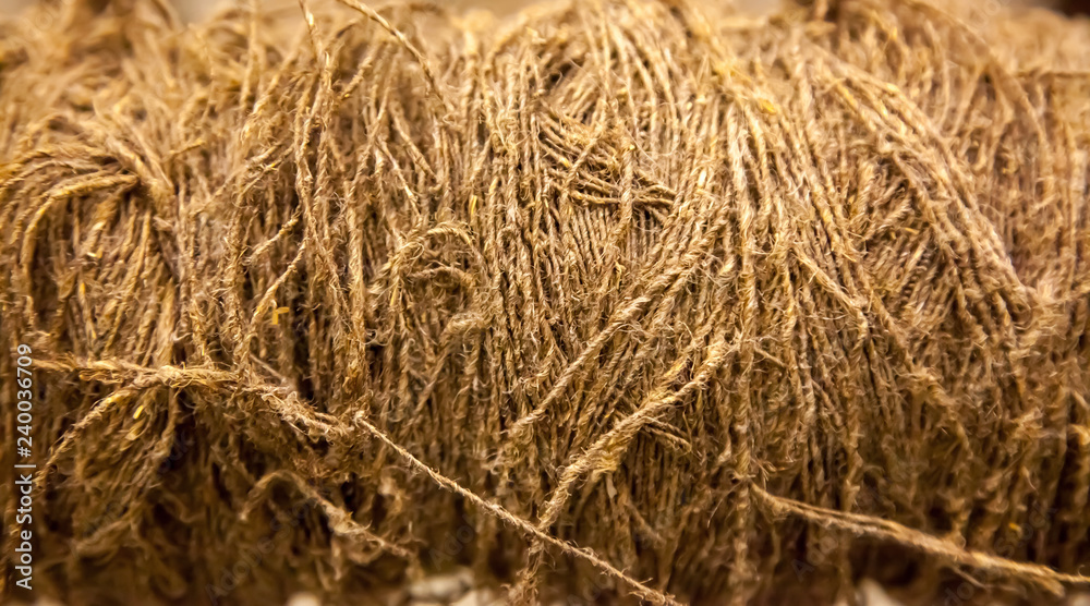 Light brown thread background. Not evenly spaced. Background and texture. Light brown thread background. Not evenly spaced. Background and texture.
