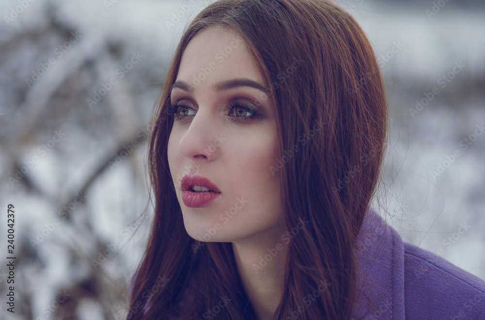Portrait of beautiful woman look at somewhere in the winter time Portrait of beautiful woman look at somewhere in the winter time