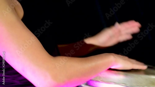 Person Playing Bongo Drums