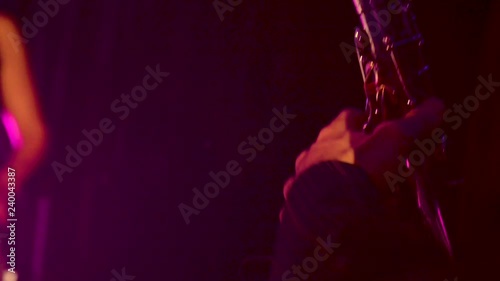 A Man Playing Sax & a Woman Playing Bongos Live