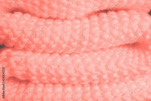 Texture of knitted coral fabric.