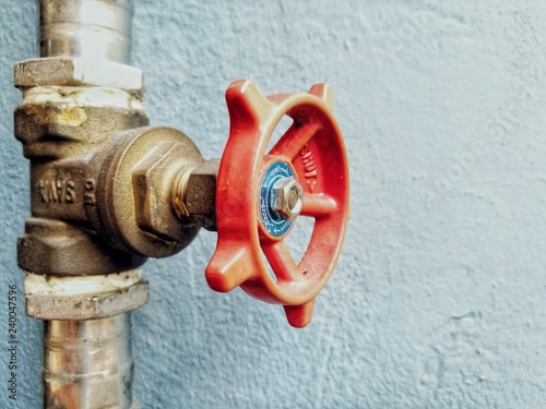 View of a red water main tap