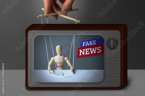 Fake News on TV. The correspondent as the doll controls the puppeteer. Lying information to trick people on TV