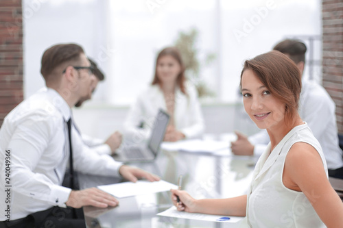 young employee at a working meeting
