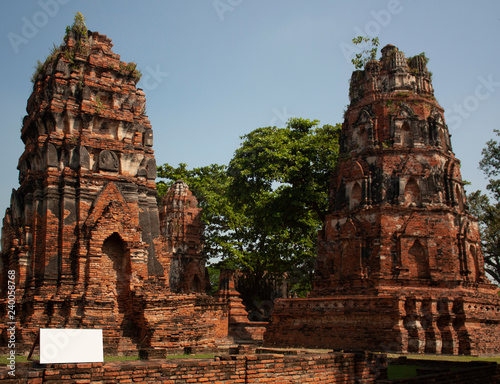 Pair of Thai pagodas in Ruins of Ancient Thailand © Amalia
