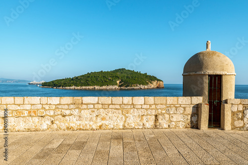 Canvastavla A Gun turret on old city walls of Dubrovnik with Lokrum in background