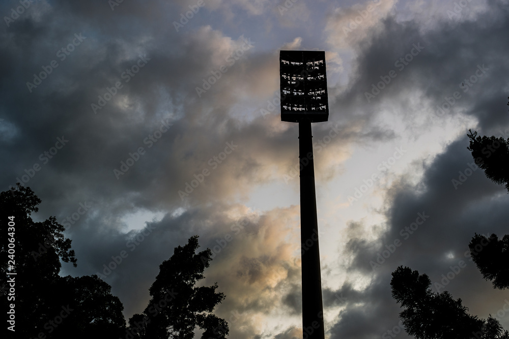light tower and clouds at dawn light tower and clouds at dawn